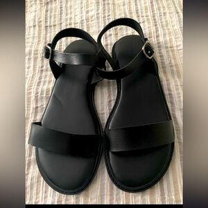 Women’s 11 wide Torrid Black flat sandal, never been worn.